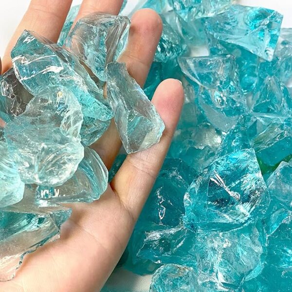 55 lbs. of Frosted River 3-5cm Tumbled, Crushed Glass Rocks Blend ideal for landscaping, crafts, water features, planters.