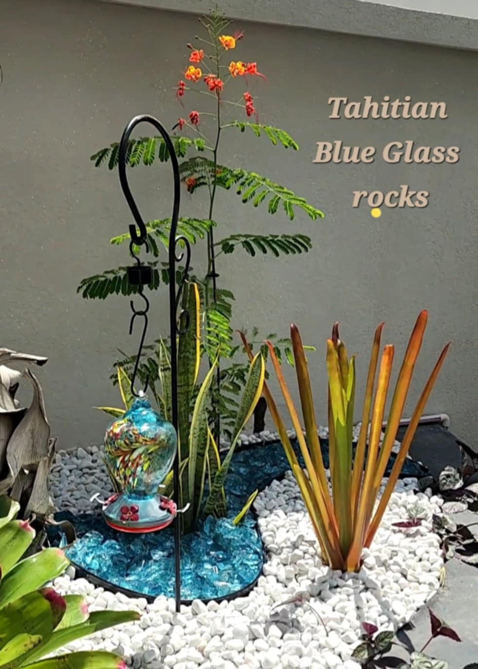 55 lbs. of Tahitian 3-5cm Tumbled, Crushed Glass Rocks Blend ideal for landscaping, crafts, water features, planters.